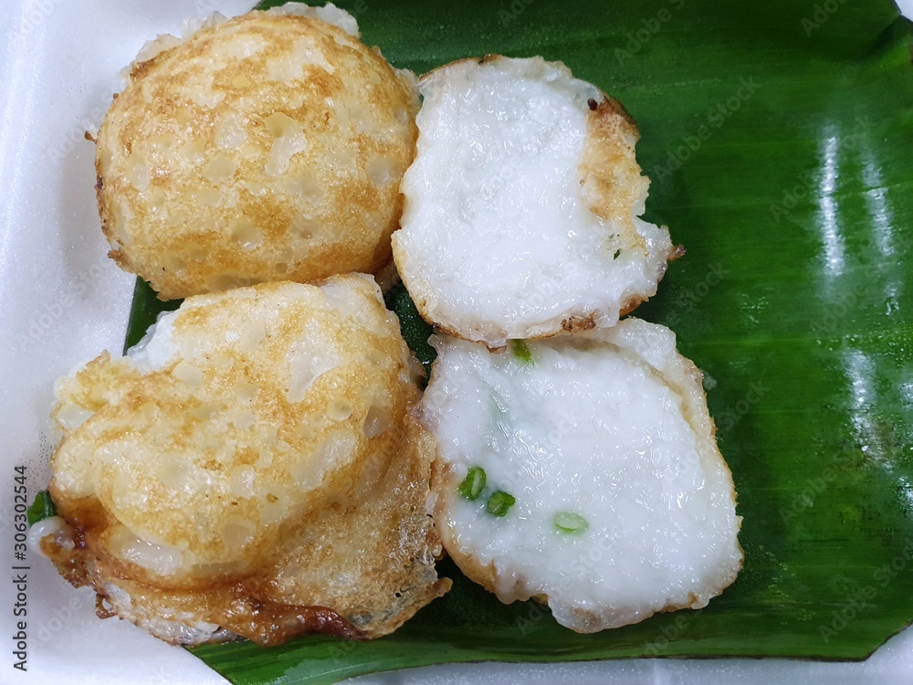 Top view of Mortar toasted pastry on banana leaf as a background on street food at Thailand, Ready to eat