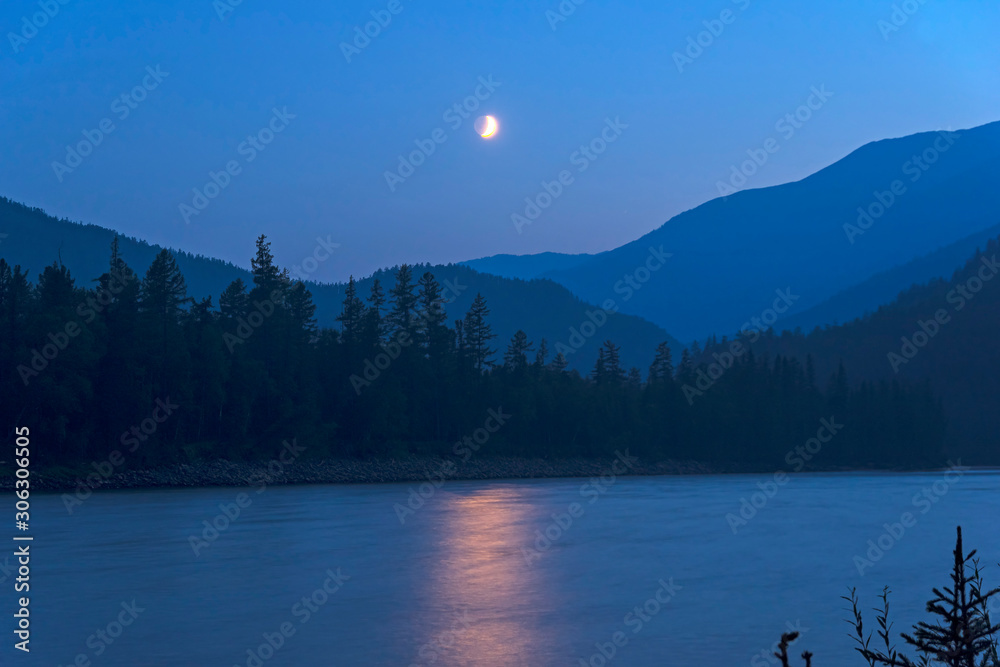 Fototapeta Moonlit night on the river.