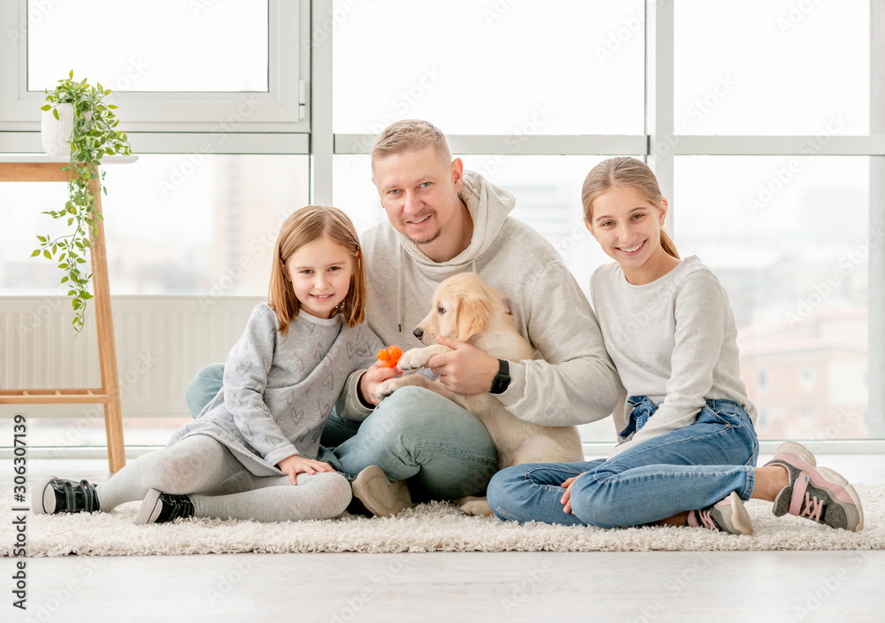 Happy family and puppy Happy family and puppy