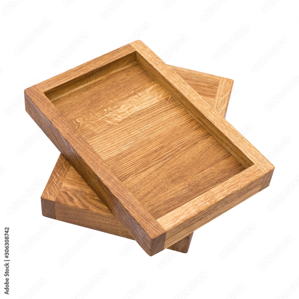 Isolated wooden tray on white bakrground. Wooden box, wooden case. Tray for serving. Isolated wooden tray on white bakrground. Wooden box, wooden case. Tray for serving.
