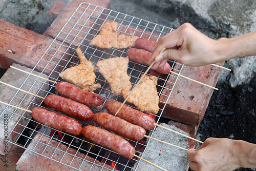 Closeup grilled meat, taiwanese cuisine on white background