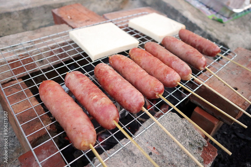 Closeup grilled meat, taiwanese cuisine on white background