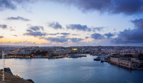 Malta. Panoramic view of Marsamxett Harbour from the city walls of Valletta in the evening.