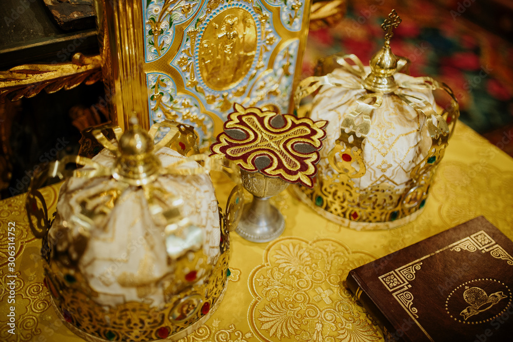 Wedding ceremony crowns inside a Christian Orthodox church