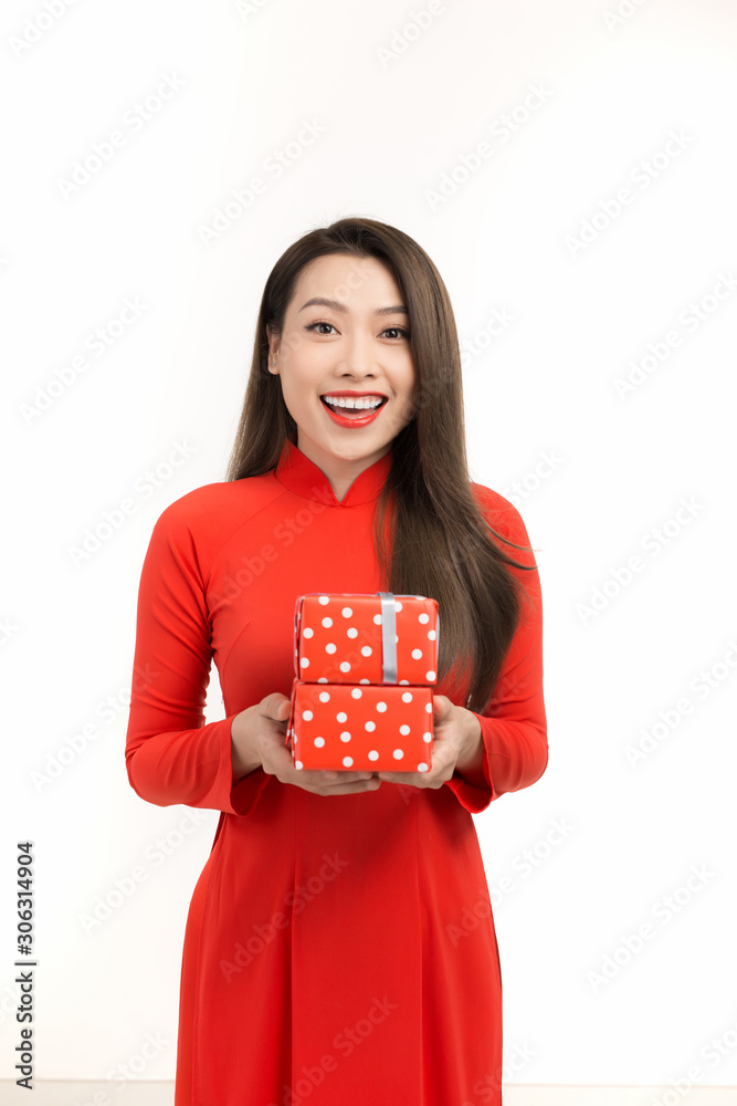 happy lunar new year. young woman holding gift box happy lunar new year. young woman holding gift box