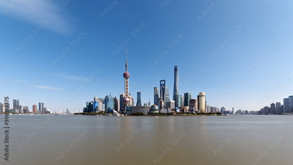 beautiful Shanghai Lujiazui Cityscape with blue sky background viewed from the bund.