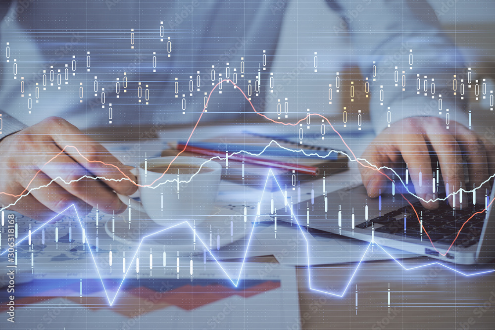 Forex graph with businessman working on computer in office on background. Concept of hardworking. Double exposure. Forex graph with businessman working on computer in office on background. Concept of hardworking. Double exposure.