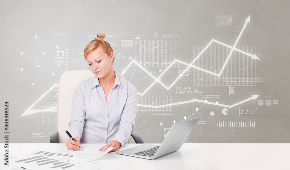 Business person sitting at desk with financial change, and report making concept Business person sitting at desk with financial change, and report making concept