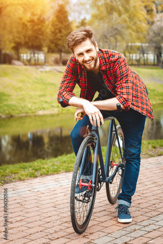 Handsome Young Man With Bicycle