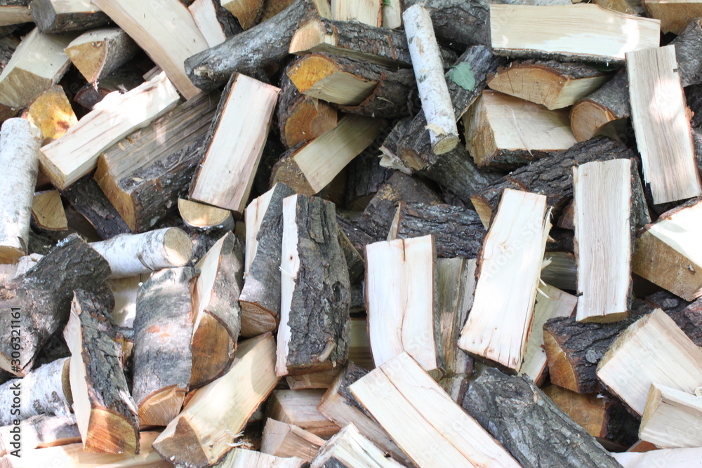 Texture of sawn wooden planks, bars in a chaotic position Texture of sawn wooden planks, bars in a chaotic position