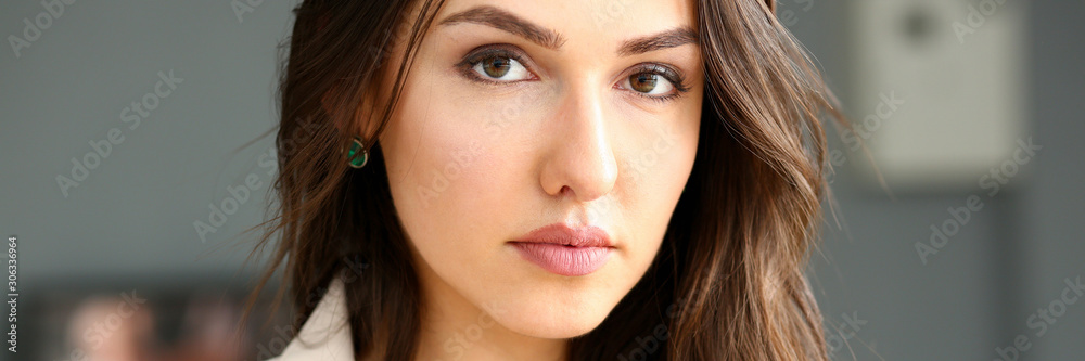Beautiful smiling girl at workplace look in camera Beautiful smiling girl at workplace look in camera
