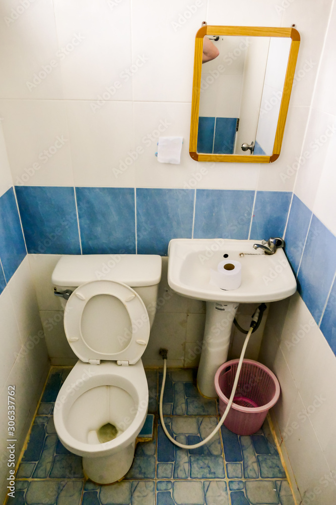 Beautiful photo of dirty bad hotel room taken in thailand Stock Photo