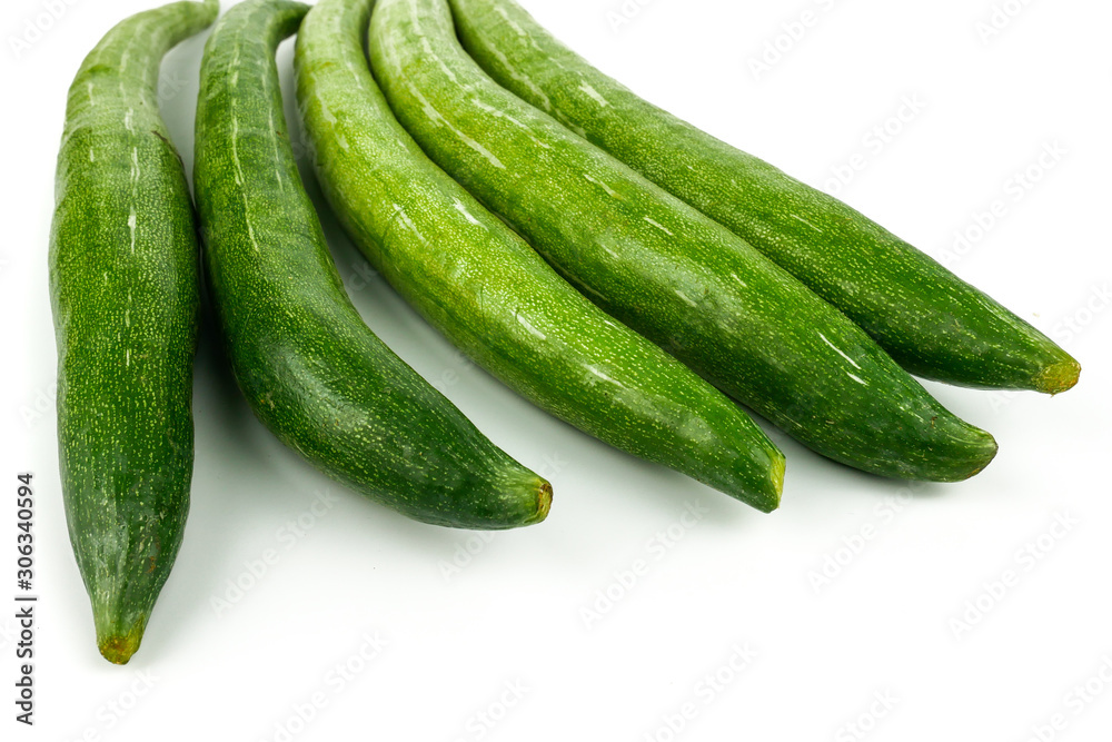 Snake gourd, Serpent gourd, Chichinda, Trichosanthes anguina Linn or cucumerina Isolated on white background. food ingredient and Healthy food for slow down aging Snake gourd, Serpent gourd, Chichinda, Trichosanthes anguina Linn or cucumerina Isolated on white background. food ingredient and Healthy food for slow down aging