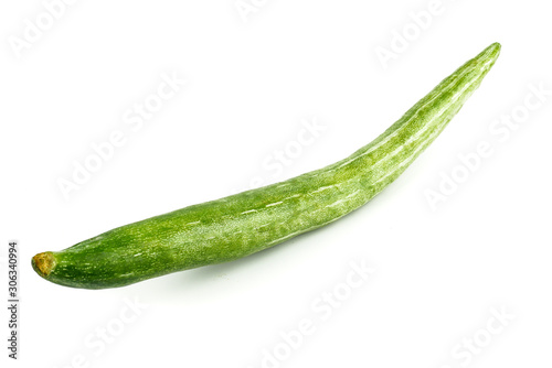 Snake gourd, Serpent gourd, Chichinda, Trichosanthes anguina Linn or cucumerina Isolated on white background. food ingredient and Healthy food for slow down aging photo