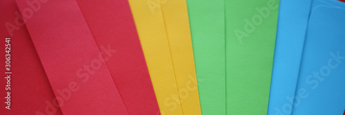 Set of colourful envelopes lying in fantail shape