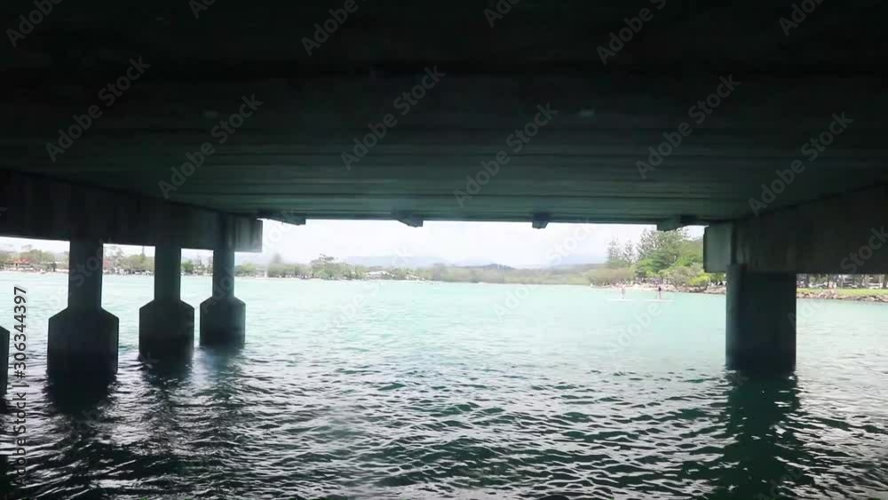 Boat Driving Under A Bridge Blue Water Sunny Day Boat Driving Under A Bridge Blue Water Sunny Day