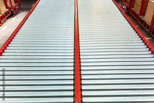 Tablou pe pânză Top view on a conveyer belt at the factory