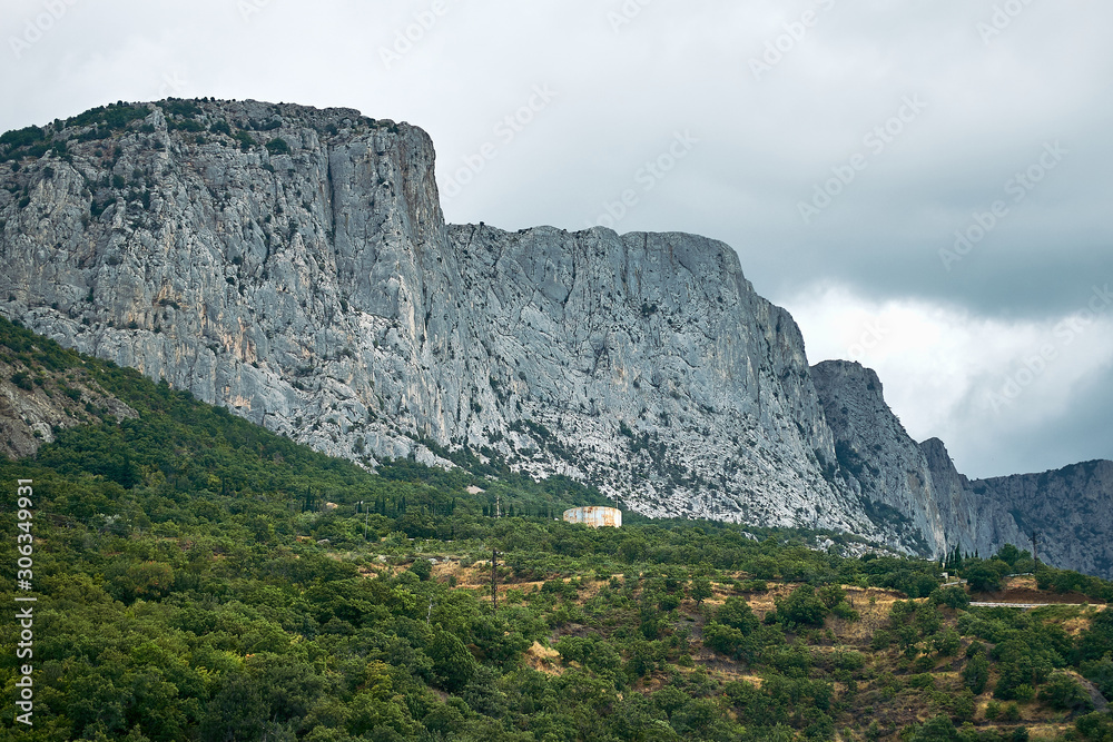 View of the mountain near to the forest. Concept of the tourism, nature, summer travel, hiking