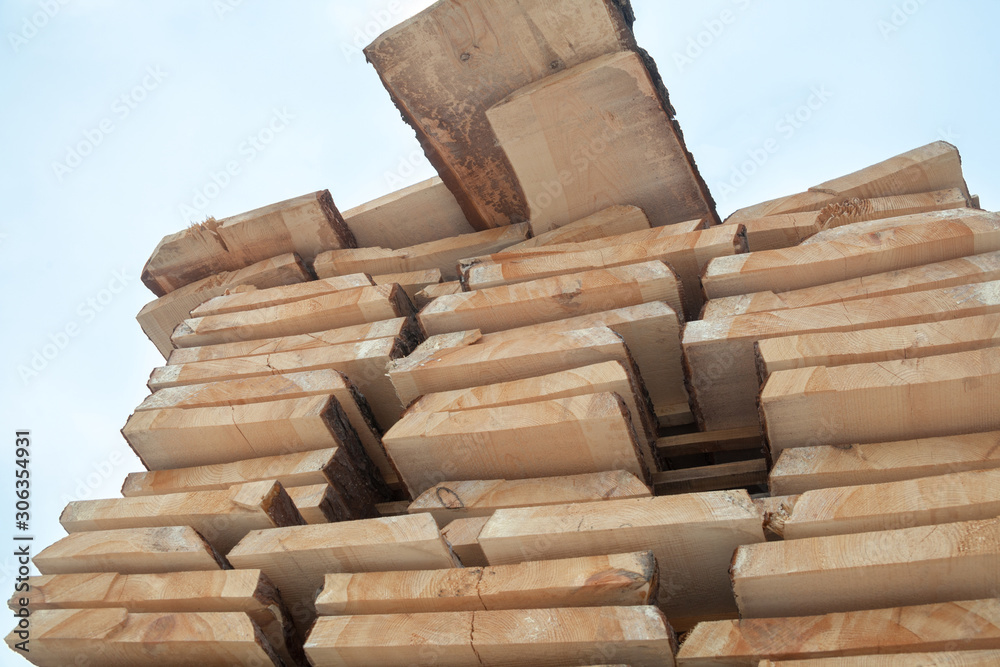 Fototapeta premium Wooden planks. Air-drying timber stack.
