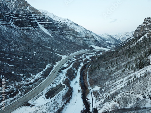 Wallpaper Mural Road between frozen mountains in the winter Torontodigital.ca