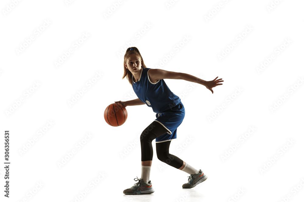 Young caucasian female basketball player of team in action, motion in run isolated on white background. Concept of sport, movement, energy and dynamic, healthy lifestyle. Training, practicing.