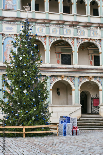 Christmas tree and facade of the Renaissance town hall building in Poznan.