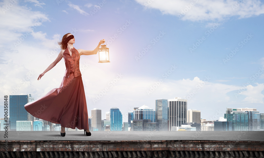 Attractive girl muse with old lantern in hand at summer day. Mixed media Attractive girl muse with old lantern in hand at summer day. Mixed media