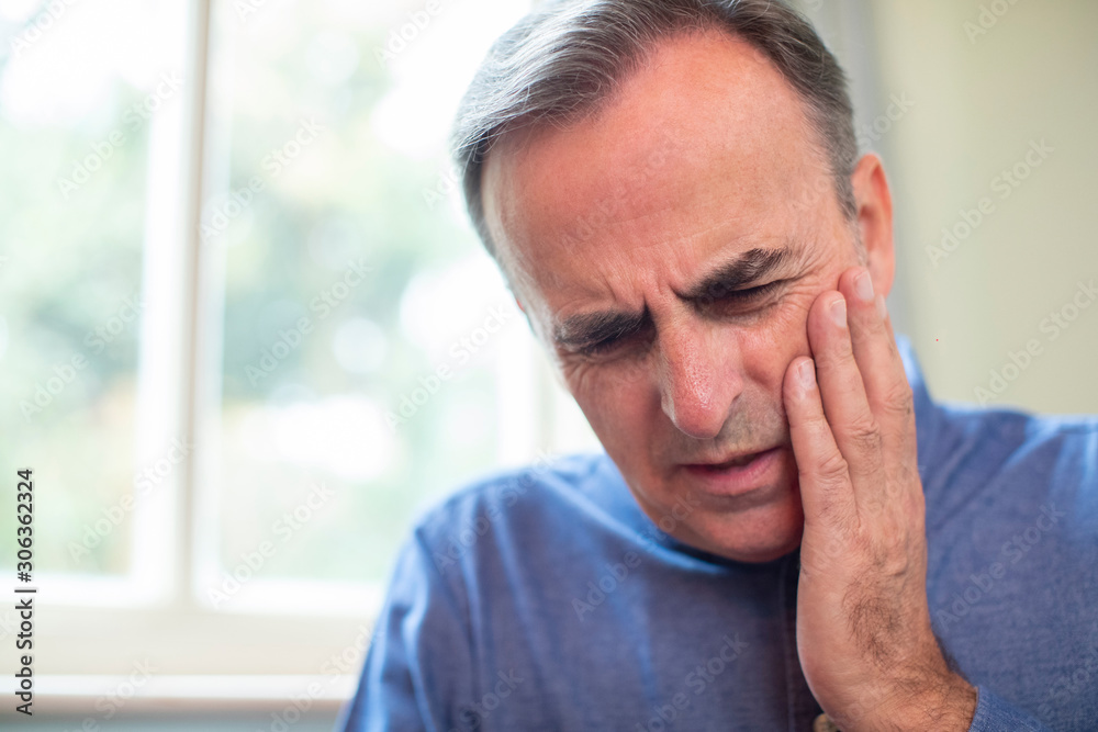 Mature Man Suffering With Toothache And Rubbing Painful Tooth Mature Man Suffering With Toothache And Rubbing Painful Tooth