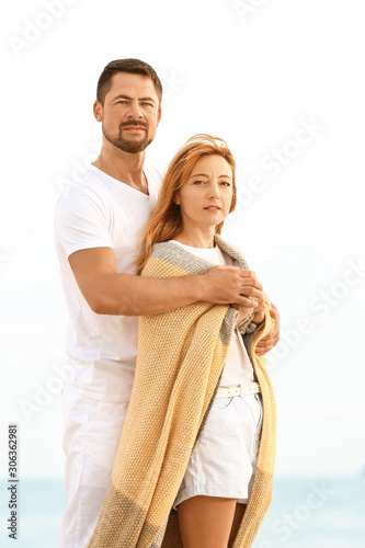 Happy couple resting at sea...