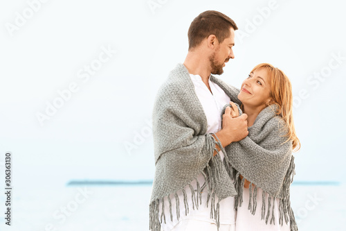 Happy couple resting at sea...