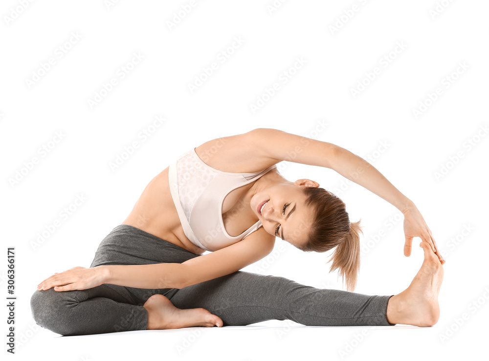 Beautiful young woman practicing yoga on white background Beautiful young woman practicing yoga on white background