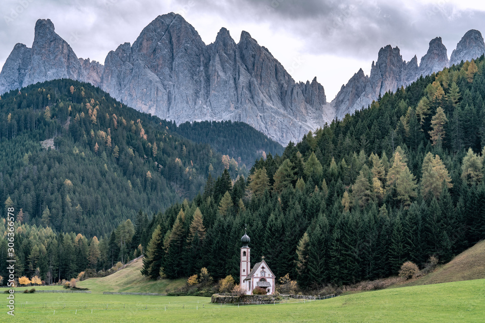St. Johann in Ranui - a small church in front of the Dolomite mountais Geissler massif
