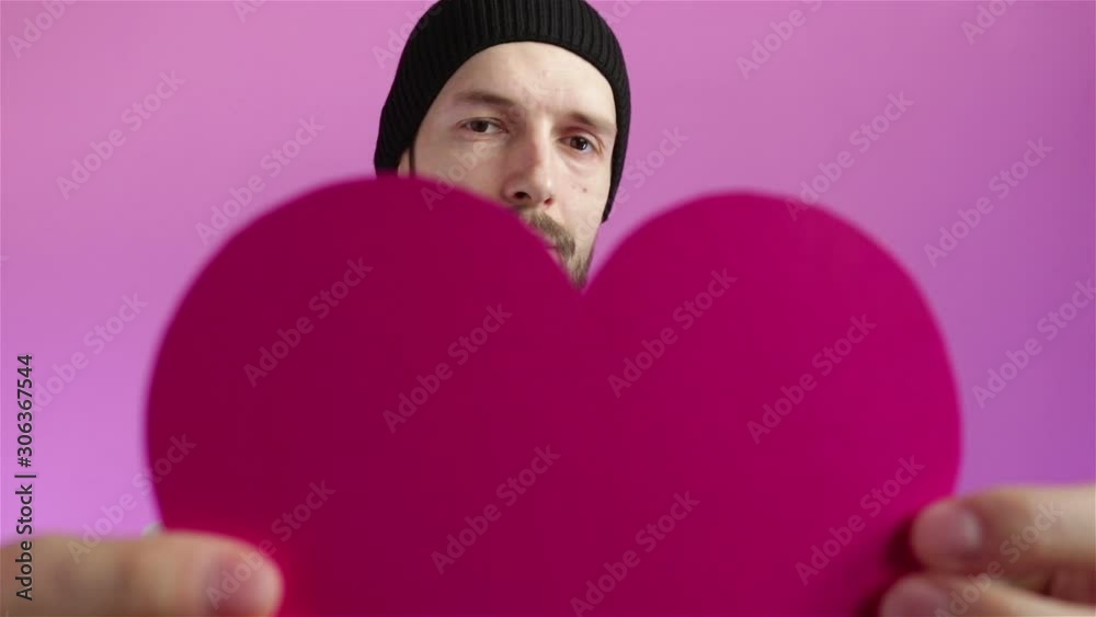 bearded man gives paper heart valentines day concept bearded man gives paper heart valentines day concept