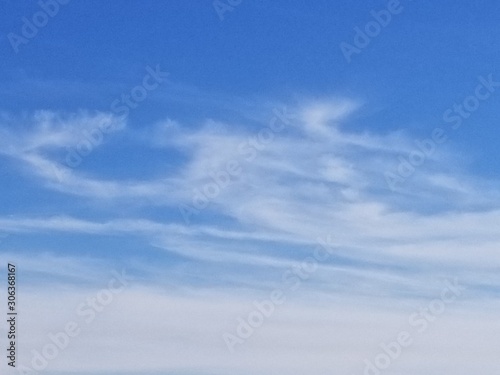 sky, clouds, blue, cloud, nature, white, weather, cloudy, air, heaven, day, cloudscape, summer, light, fluffy, atmosphere, abstract, skies, sun, beautiful, clear, space, beauty, spring, high © vicki