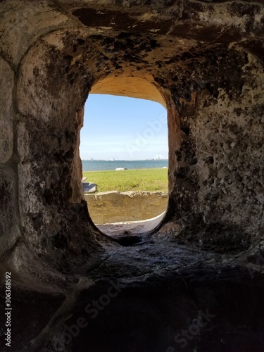 window, stone, old, landscape, castle, sea, nature, sky, arch, wall, architecture, rock, blue, view, travel, ancient, water, ruins, ocean, door, building, tunnel, summer, open, beach