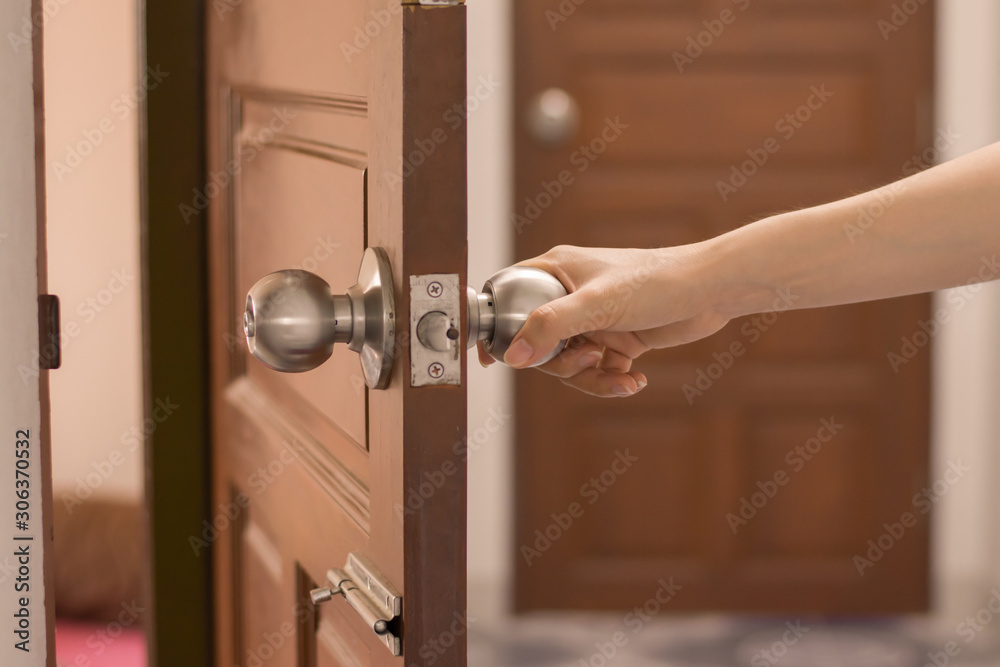 Women hand opens door Close up hand open door. Stock Photo Adobe Stock