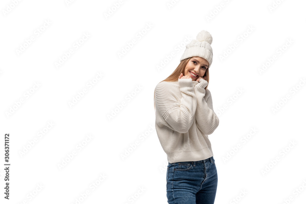 beautiful woman posing in jeans, white knitted sweater and hat, isolated on white beautiful woman posing in jeans, white knitted sweater and hat, isolated on white