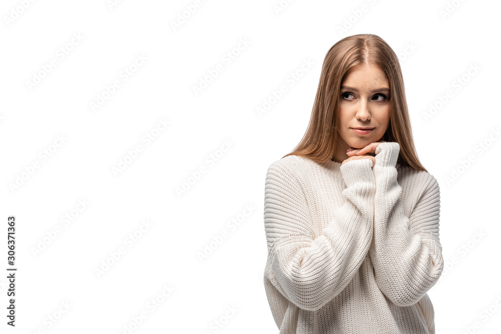 attractive pensive woman posing in white sweater, isolated on white attractive pensive woman posing in white sweater, isolated on white