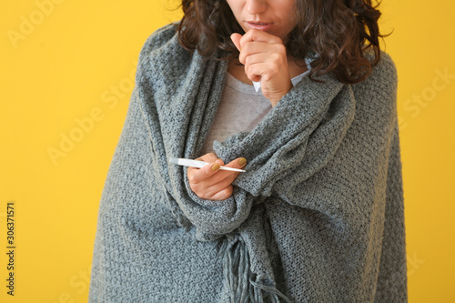 Sick woman measuring temper...