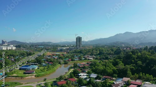 4K Aerial Drone Footage Of Beautiful Rural Town Of Menggatal Town, Sabah, Malaysia photo