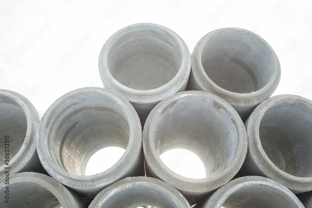 Stack of new concrete pipes. Stack of new concrete pipes.