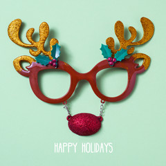 reindeer eyeglasses and text happy holidays