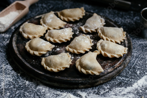 The process of making dumplings, pies in the kitchen