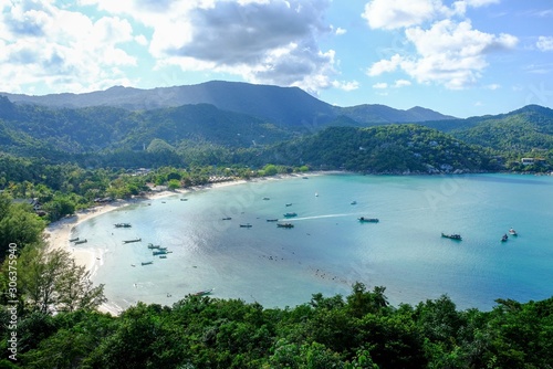 Fototapeta Naklejka Na Ścianę i Meble -  Views of Thong Nai Pan Bay, Koh Phangan, high angle Sea colors, beautiful natural sky A place to relax, beautiful and quiet.