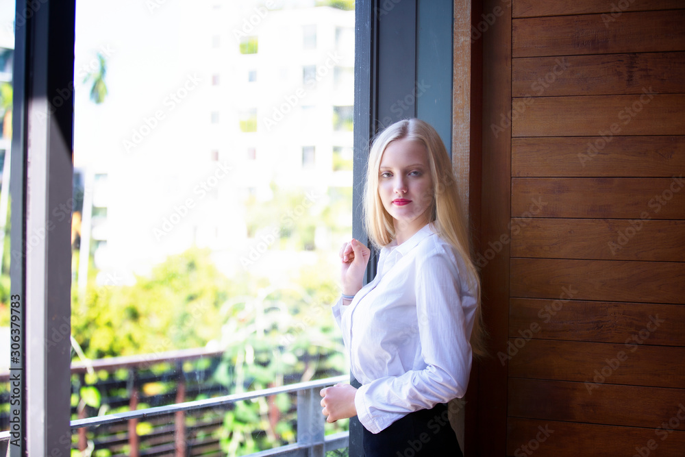 portrait of blond hair women white shirt smiling look at camera portrait of blond hair women white shirt smiling look at camera