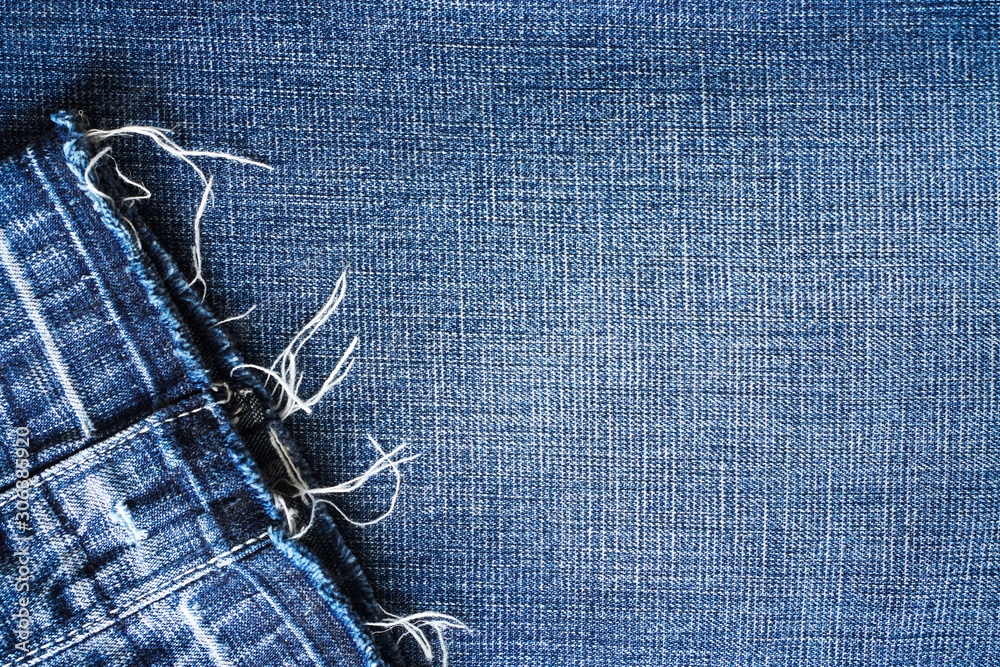 Ripped leg on blue jeans background ,denim texture for traditional business  in blue color, trendy fashion torn blue jeans,pattern for advertisement,  backdrop or wallpaper Stock Photo | Adobe Stock