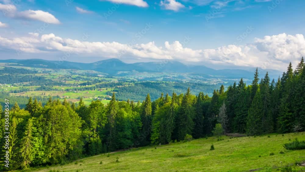 Fantastic Mountain Landscape with a Fast Fluffy Clouds and Shadows. Timelapse. 4K. Fantastic Mountain Landscape with a Fast Fluffy Clouds and Shadows. Timelapse. 4K.