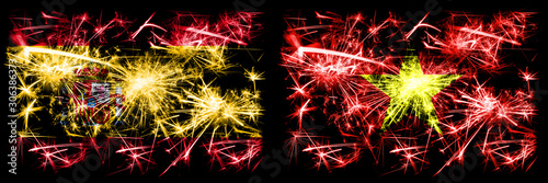 Spanish vs Vietnam, Vietnamese New Year celebration sparkling fireworks flags concept background. Combination of two abstract states flags. © Vlad