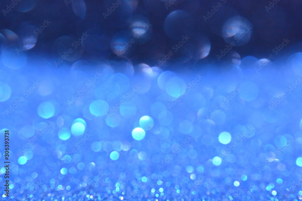 Beautiful Abstract Defocused Sparkle Glitter Lights Background. Deep Dark Royal Navy Blue, Sapphirine. Shine Bokeh Effect. For party, holidays, celebration. Beautiful Abstract Defocused Sparkle Glitter Lights Background. Deep Dark Royal Navy Blue, Sapphirine. Shine Bokeh Effect. For party, holidays, celebration.
