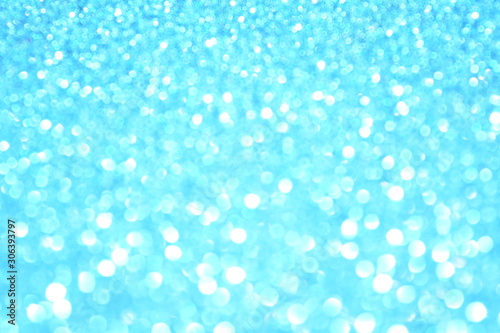 Beautiful Abstract Sparkle Glitter Lights Background. Sky Blue, Azure, Cerulean. Shine Bokeh Effect. For party, holidays, celebration.